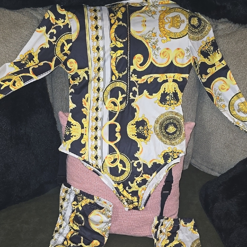 Stylish Black and Gold One Piece